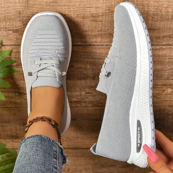 Women's gray slip-on orthopedic sneakers with arch support for plantar fasciitis relief