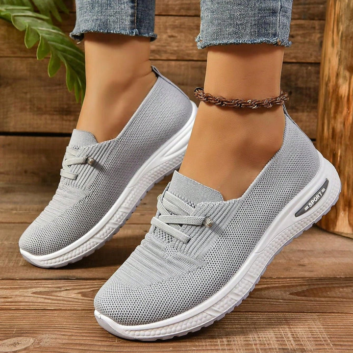 Slip-on gray women's footwear, designed for maximum comfort and arch support