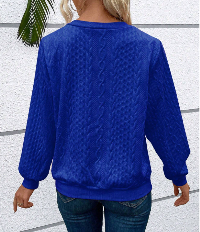 Fashion-forward women's half-zip jumper with ring pull. Ribbed hem for a flattering fit.