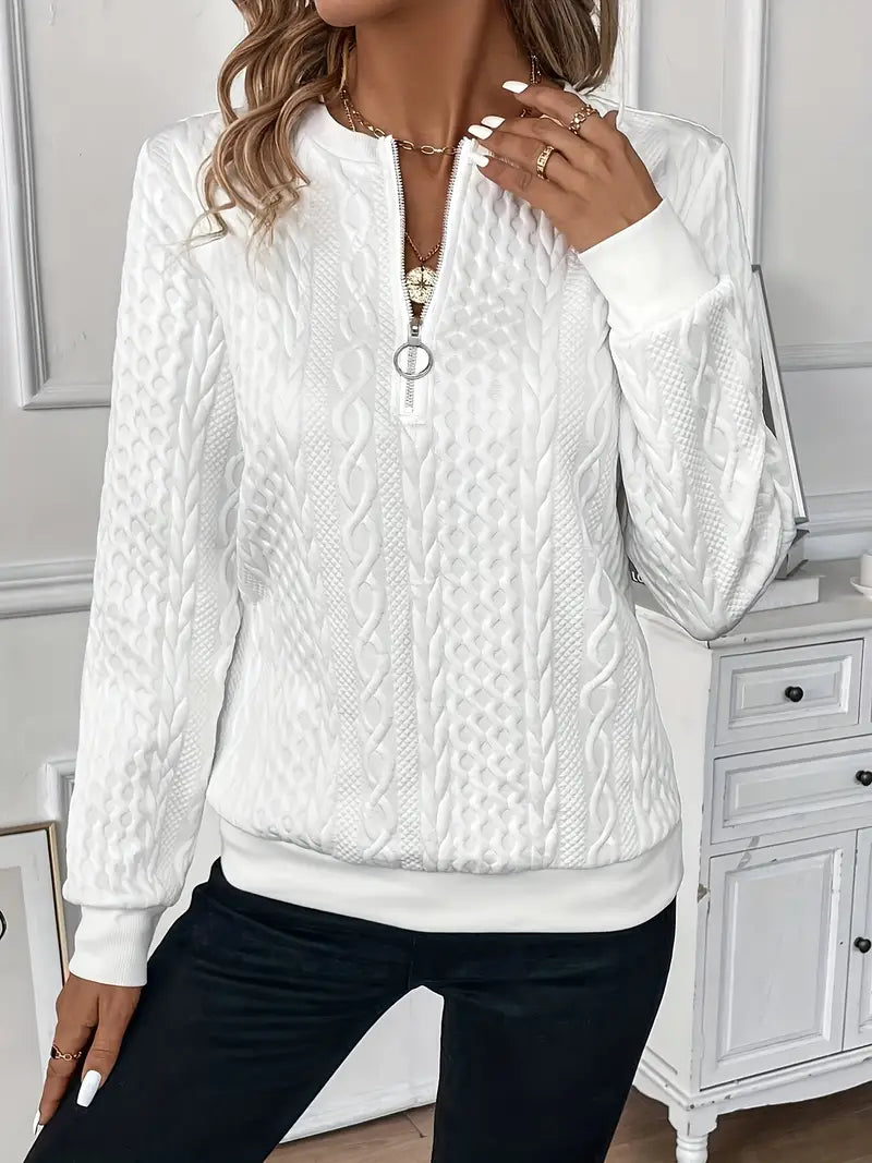 Transitional women's half-zip sweater with ring pull detail. Comfortable everyday fashion.