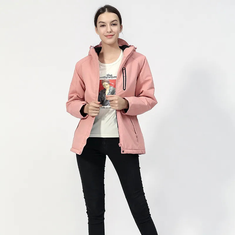 Women's heated jacket, USB-powered, with a hood & zip closure. Ideal winter jacket for cold weather outdoor wear.