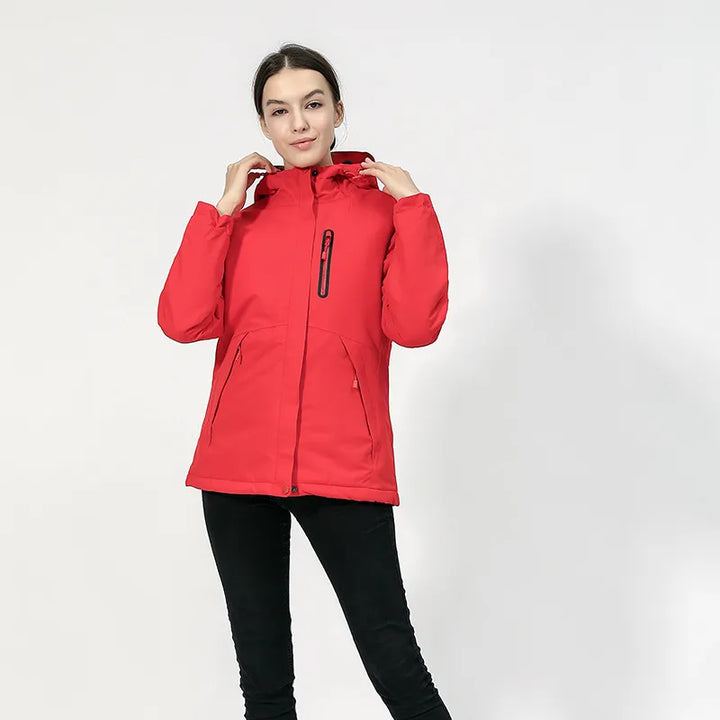 Stylish hooded women's heated jacket. Perfect winter jacket for outdoor adventures, providing warmth & comfort.