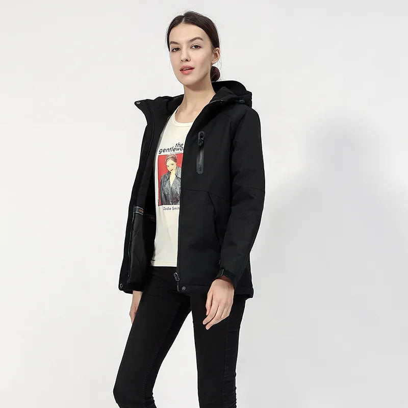Women's zip-up heated jacket with practical zippered pockets. Great thermal jacket for keeping warm outdoors.