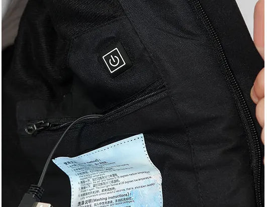 Detail of durable, weather-resistant fabric on a women's heated jacket. A robust thermal jacket for winter.