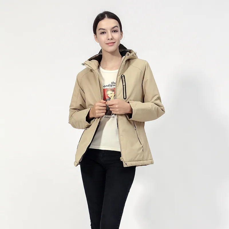 Back view of a sleek women's heated jacket with hood, designed for maximum warmth. A versatile cold weather jacket.