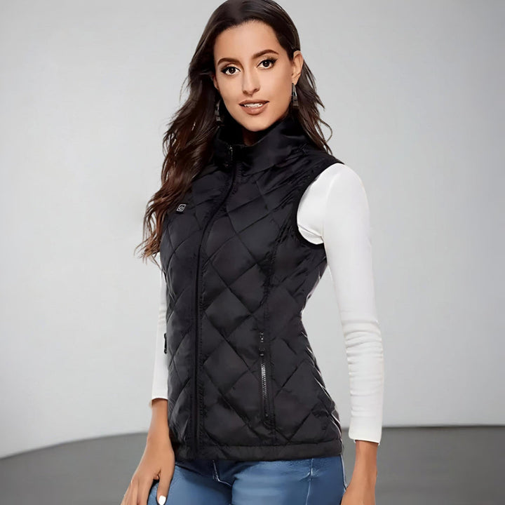 Electric women's heated vest, USB powered for winter outdoor warmth. Stylish cold weather gilet.