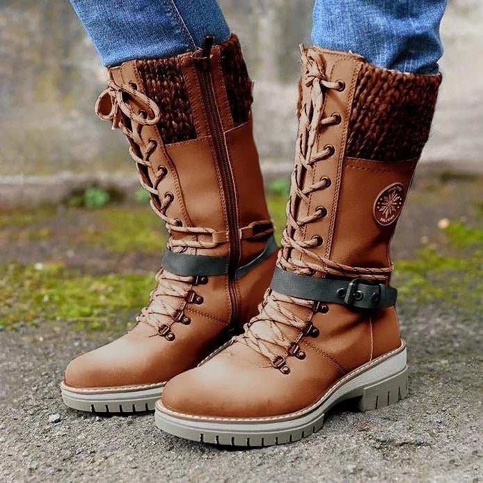 Elegant women's high winter boots with orthopedic sole, offering comfort and waterproof protection for fashion.
