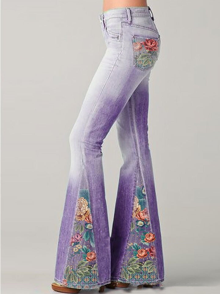 Women's embroidered high-rise bootcut jeans with a bohemian floral design. Versatile for casual & unique style.
