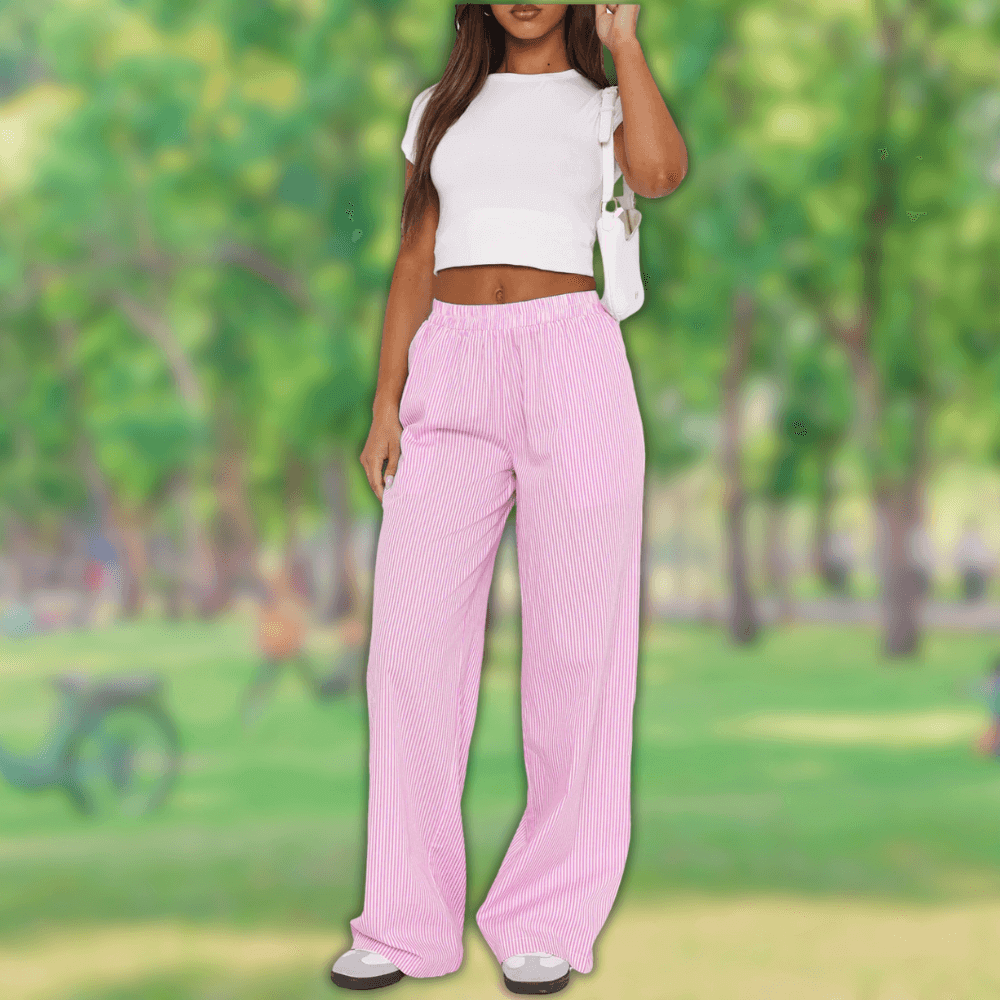 Elegant women's wide-leg trousers with a flattering high-rise fit and intricate eyelet detail. Perfect for spring.