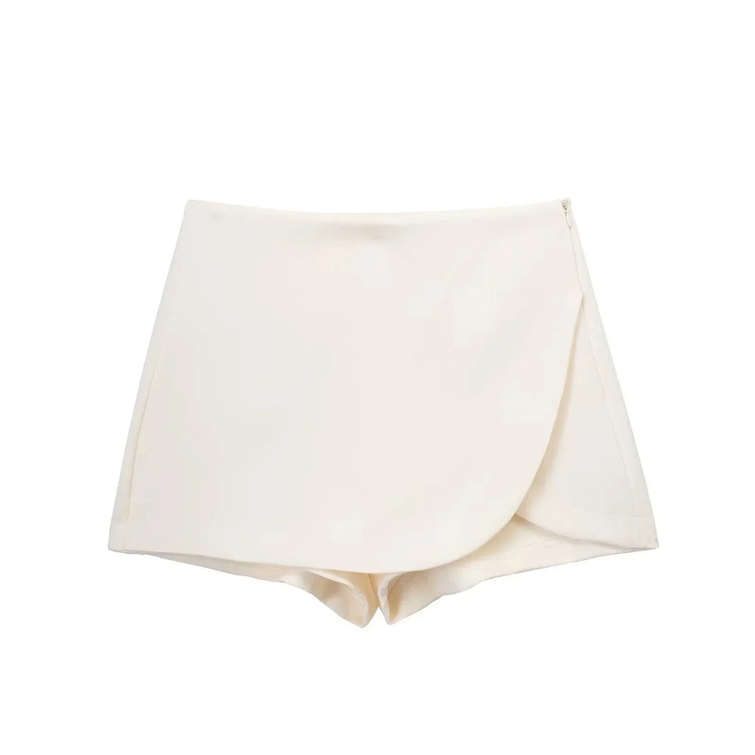 Versatile women's high waist asymmetric mini skirt, suitable for casual wear or dressing up. Modern bottoms.
