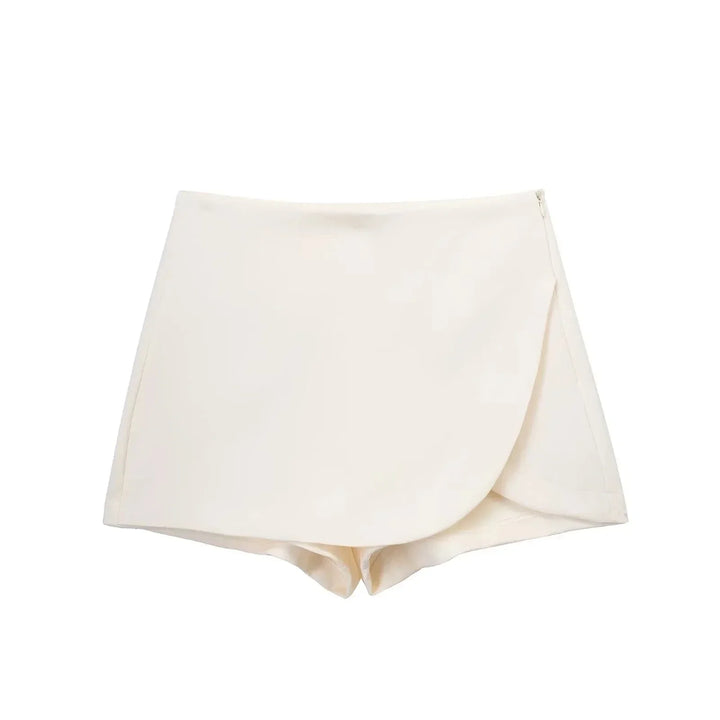 Versatile women's high waist asymmetric mini skirt, suitable for casual wear or dressing up. Modern bottoms.