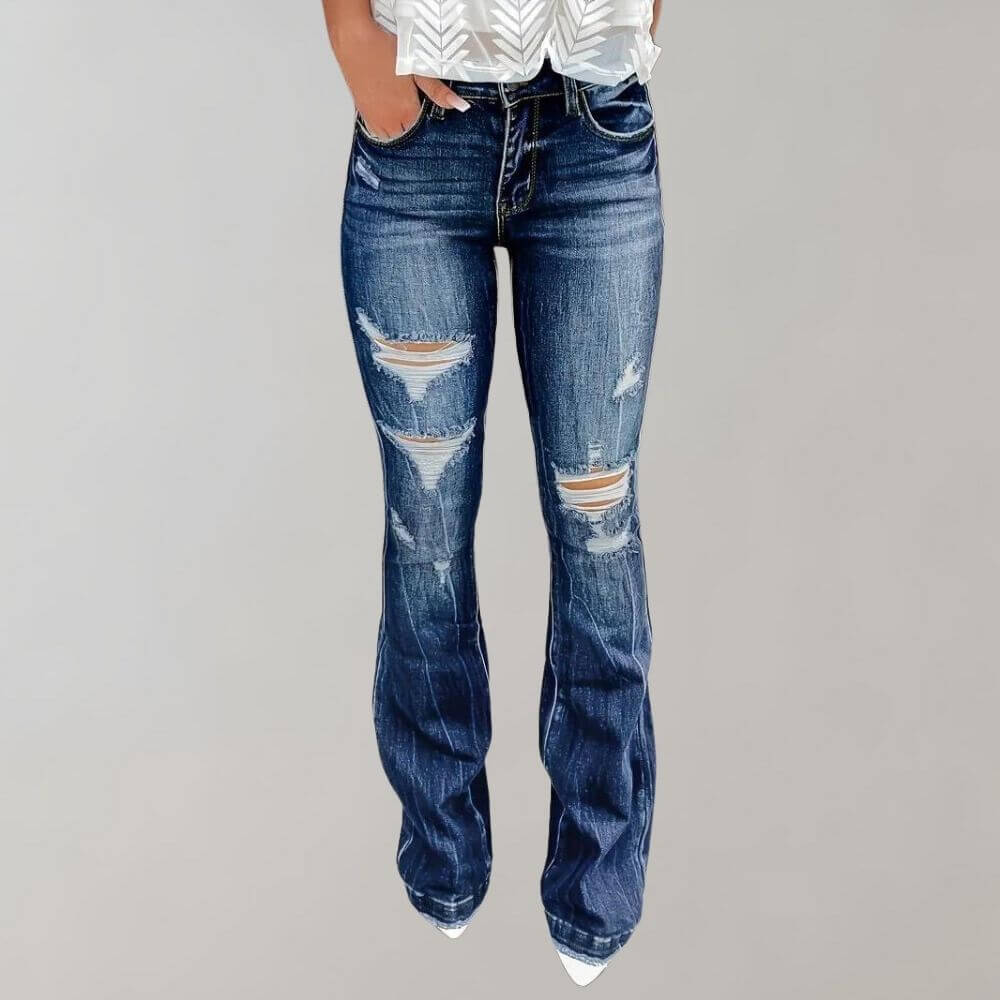 Women's high-waist flared ripped jeans in retro blue denim, perfect for casual fashion wear.