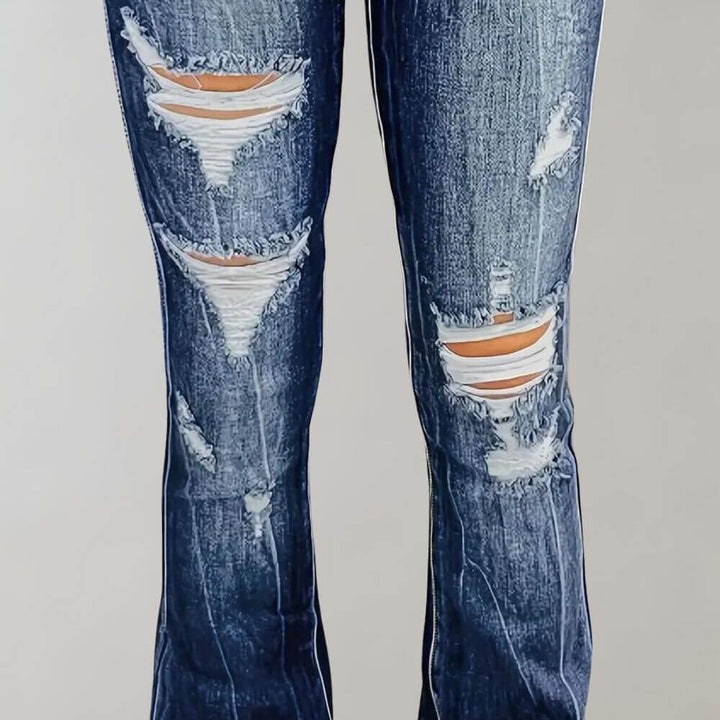 Women's retro high-waist flared ripped blue jeans. Distressed denim for a fashionable, casual outfit.