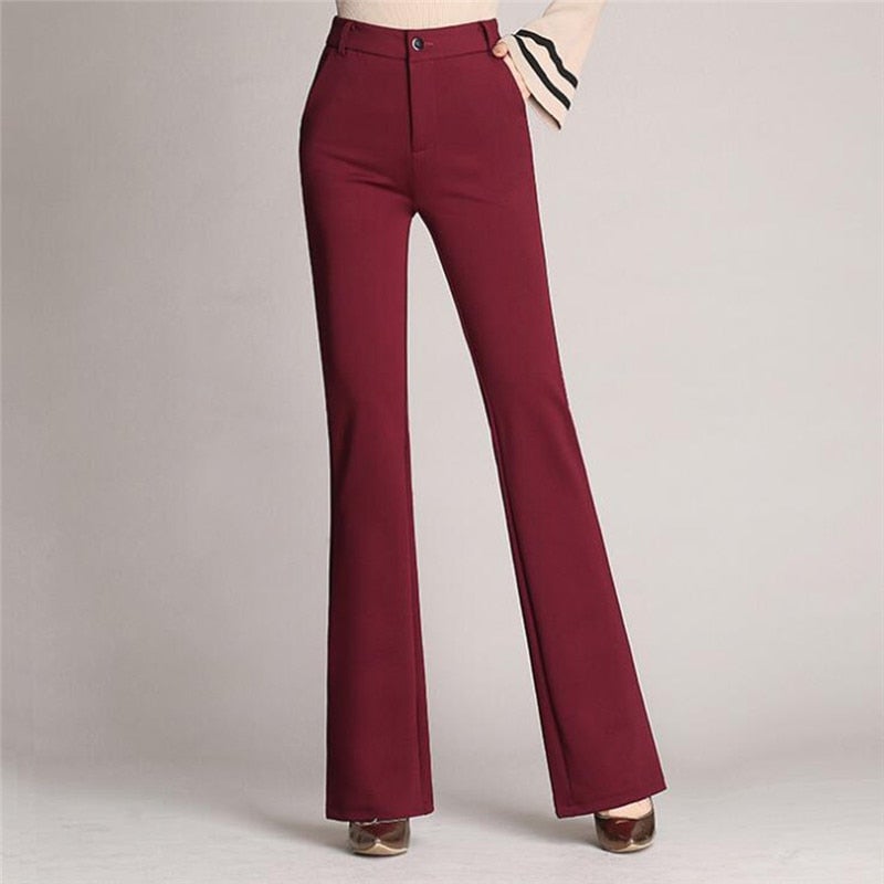Retro-style tailored high-waist flared pants for women, offering a sophisticated look for the office.