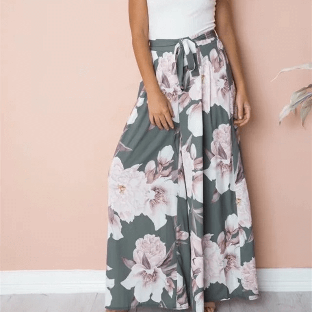 Elegant women's high waist floral print casual pants in a comfortable loose fit, suitable for spring fashion.