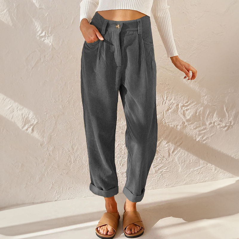 Comfortable womenswear: relaxed tapered leg pants, high waist, pleated design for classic style.