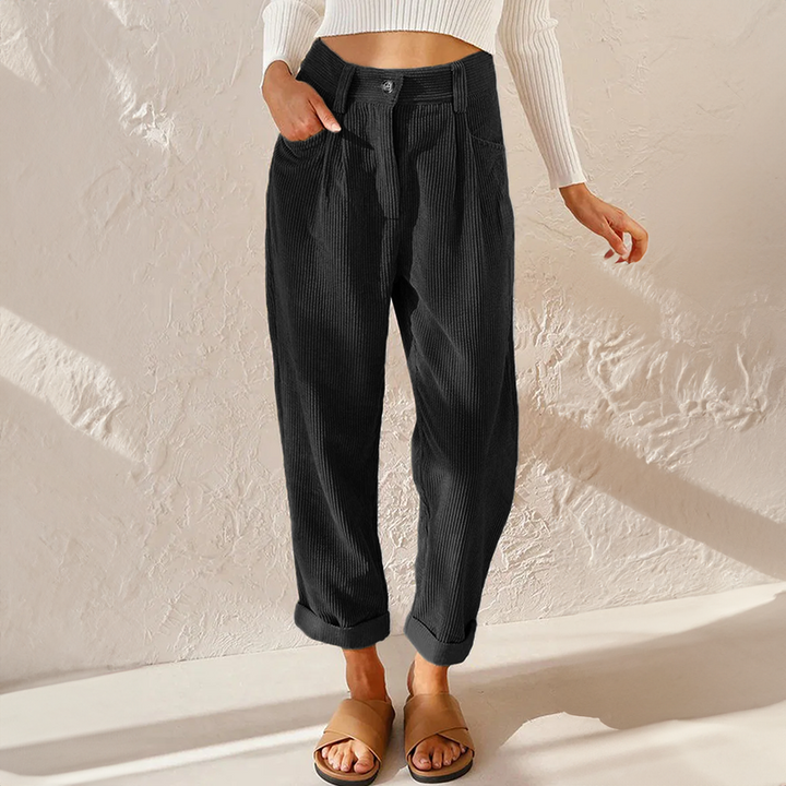 Pleated high waist tapered leg pants for women, offering a relaxed fit & comfortable classic style.