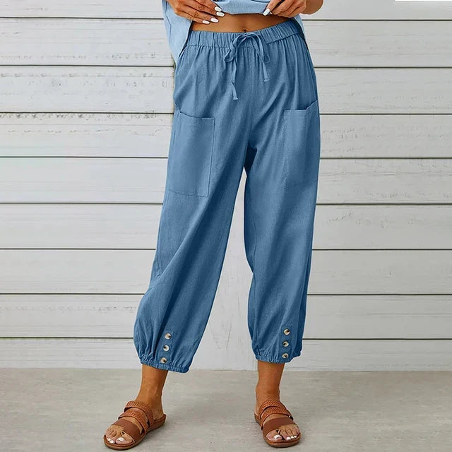 Chic women's high waist relaxed fit trousers, offering ultimate comfort and an elegant wide-leg silhouette.