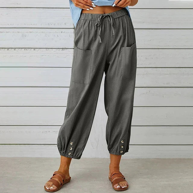 Versatile women's high waist pants with a relaxed fit and wide leg, ideal for both casual and elegant wear.