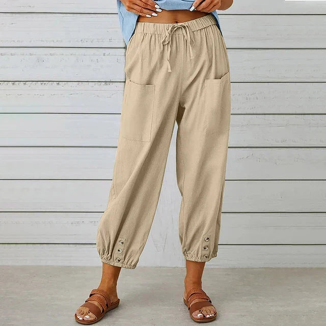 Model wearing comfortable high waist relaxed fit women's pants with a stylish wide leg for a modern look.