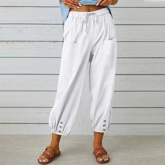 Soft, comfortable women's high waist relaxed fit trousers featuring a wide leg for effortless everyday fashion.