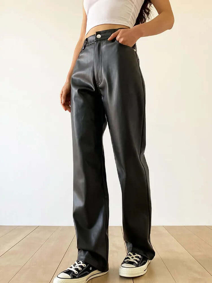 Sophisticated women's high-waisted straight-leg leather pants. Timeless vintage look for modern fashion.