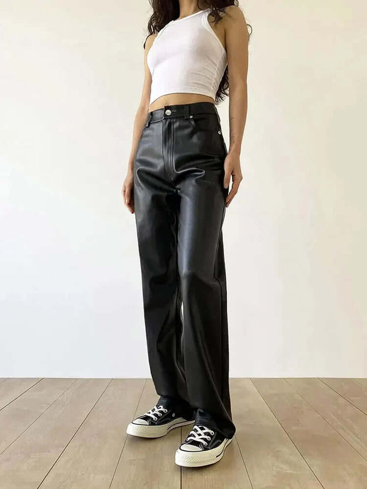 Black vintage leather pants for women, featuring a flattering high-waist and classic straight-leg cut.