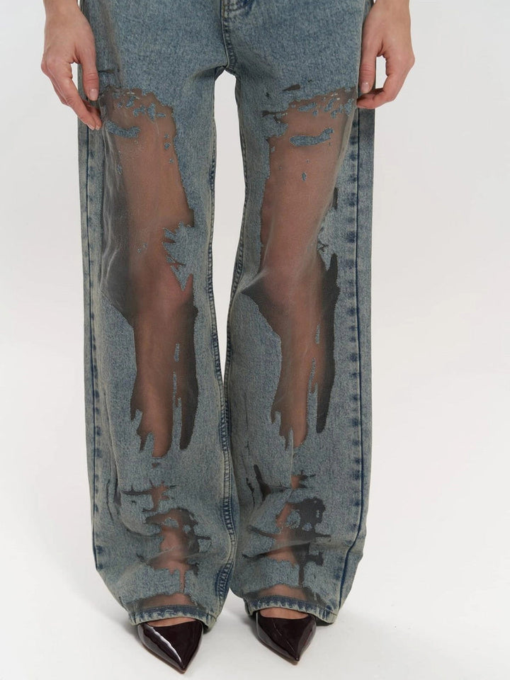 Comfortable high-waist wide leg jeans for women. Chic panel detail adds a modern touch to these indigo fashion bottoms.