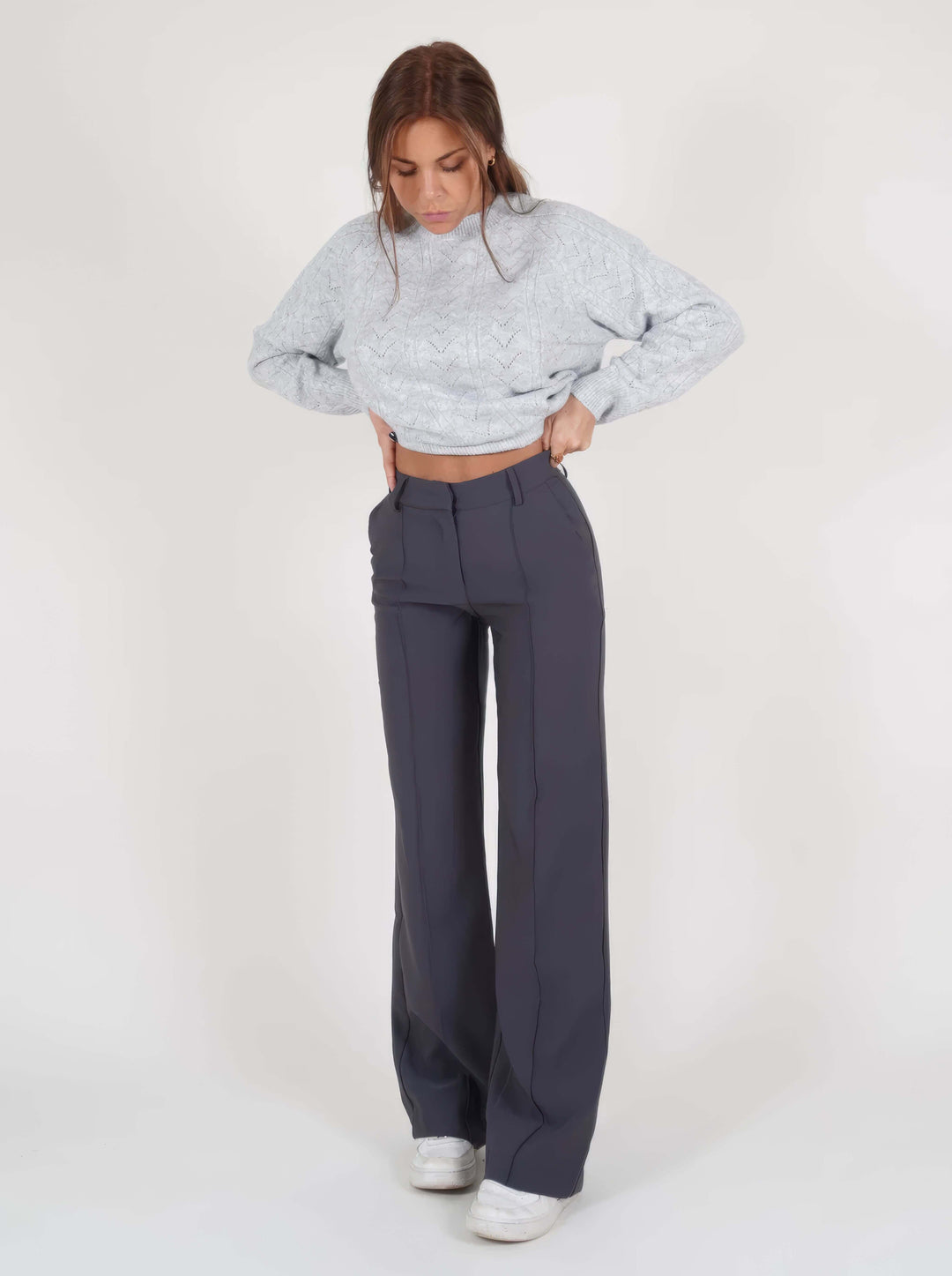 Soft, comfortable women's wide-leg high-waist trousers in a solid color, perfect for all-day wear and stylish looks.