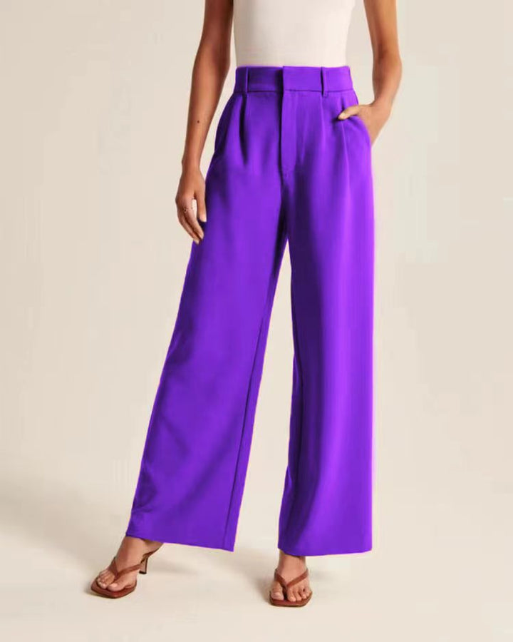 Versatile women's high-waist wide-leg trousers, ideal for office wear or chic casual outfits. Full length.