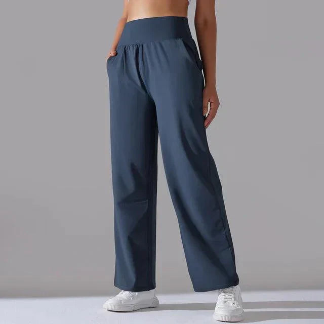 Elegant women's high-waist wide-leg flared pants, combining fashion with athletic comfort.