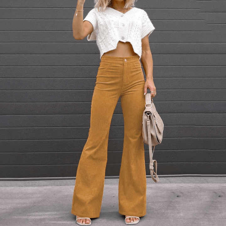 Stylish women's corduroy high-waisted trousers with a comfortable flared leg, perfect for casual fashion.