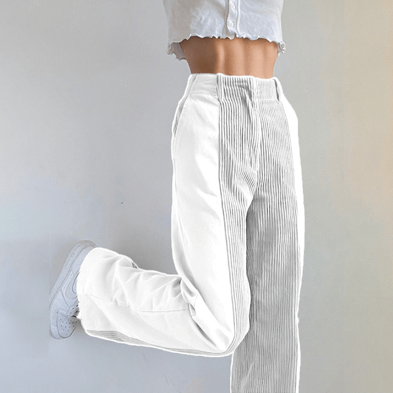 Stylish white corduroy wide leg pants for women. High-waisted design offers comfort and a trendy casual look.