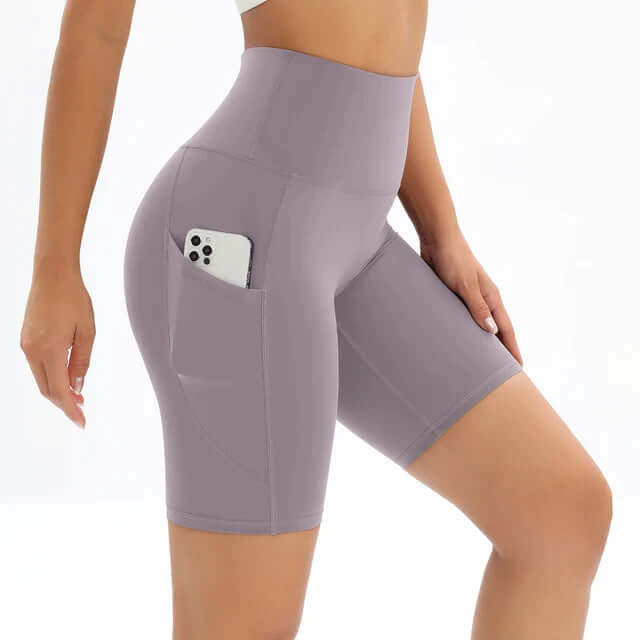 Moisture-wicking high-waisted gym shorts for women, designed for comfort during intense fitness.