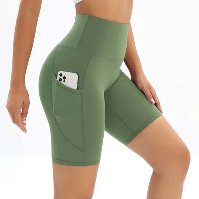 Black high-rise running shorts for women with a practical phone pocket, offering support & style.