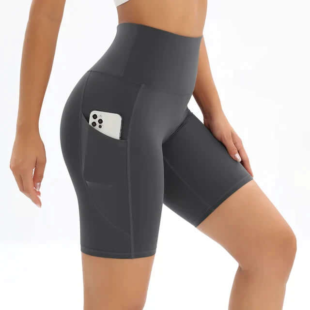 Women's performance fitness shorts with a phone pocket and high waist for secure, distraction-free workouts.