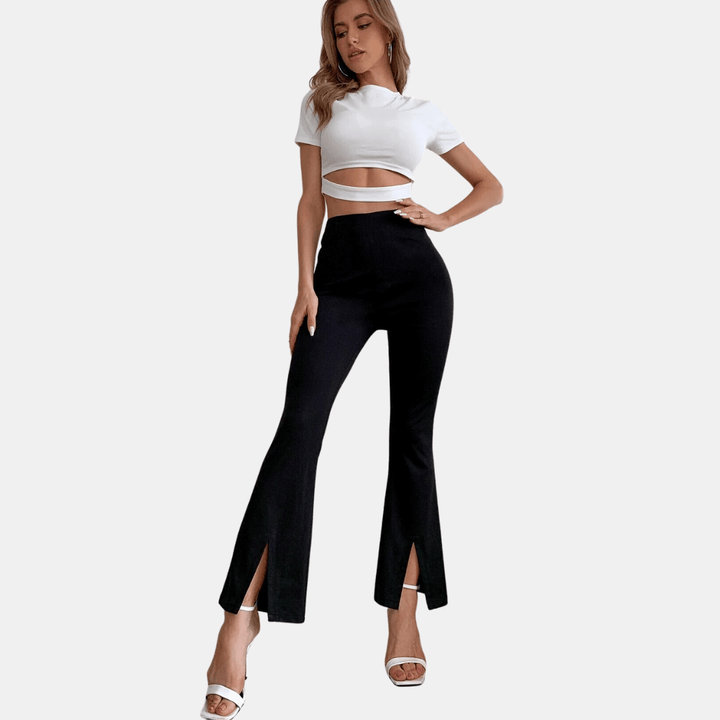 Chic women's high-waisted flare trousers with a stylish front slit, enhancing a versatile & fashionable look.