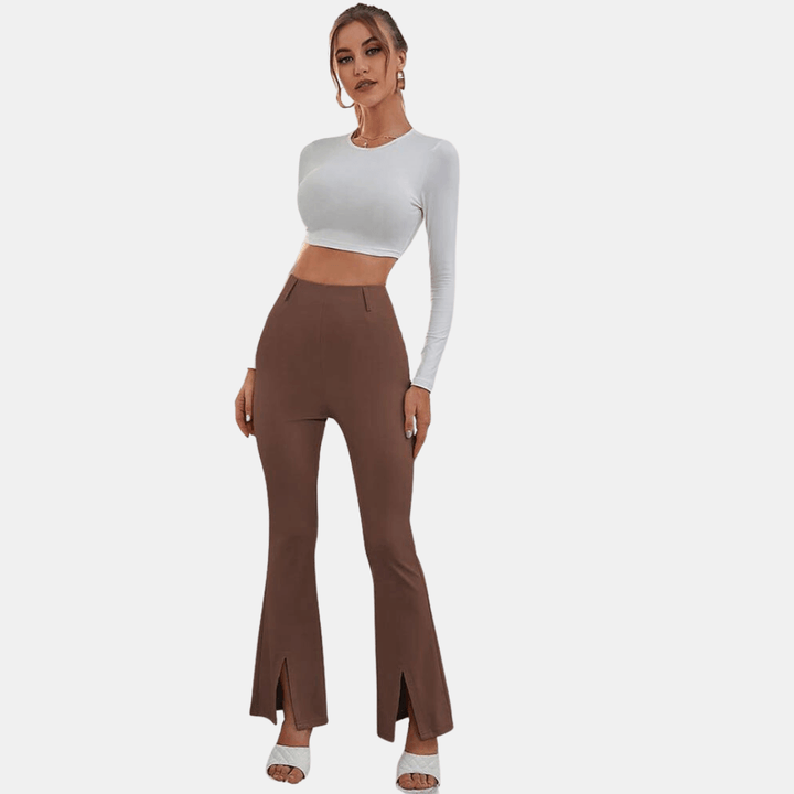 Close-up of the chic front slit detail on women's high-waisted flare trousers, highlighting unique design.