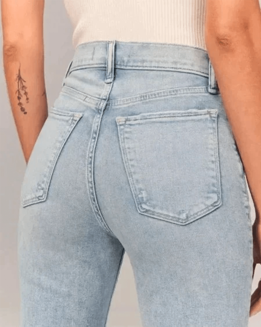 Retro-style women's flared denim jeans, featuring a chic high-waist and comfortable stretch in blue.