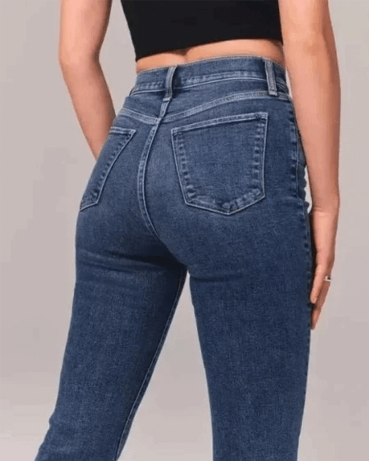 Women's blue denim pants: high-waisted, flared leg, and made with comfortable stretch fabric for casual wear.