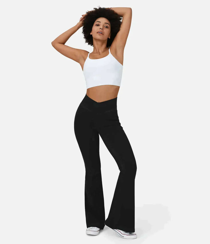 Comfortable women's high-waisted flared jeans with elastic waist, ideal for casual fashion.
