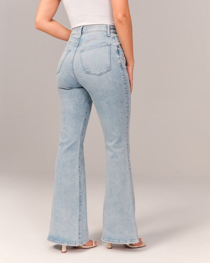 Full-length view of women's high-waisted light blue casual jeans, offering a comfortable and stylish loose fit.