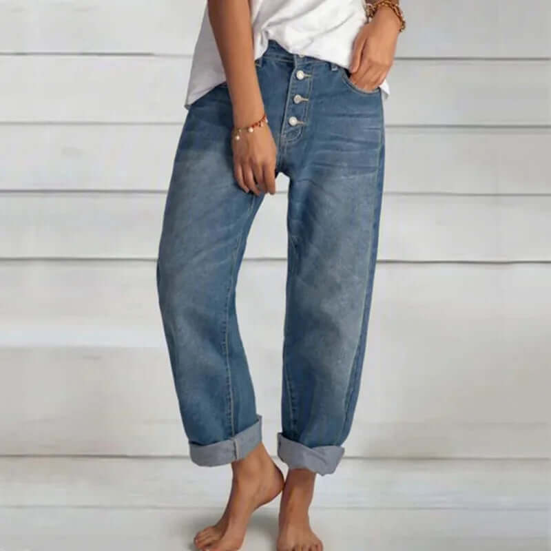 Women's high-waisted loose fit blue denim jeans for casual, comfortable everyday style.