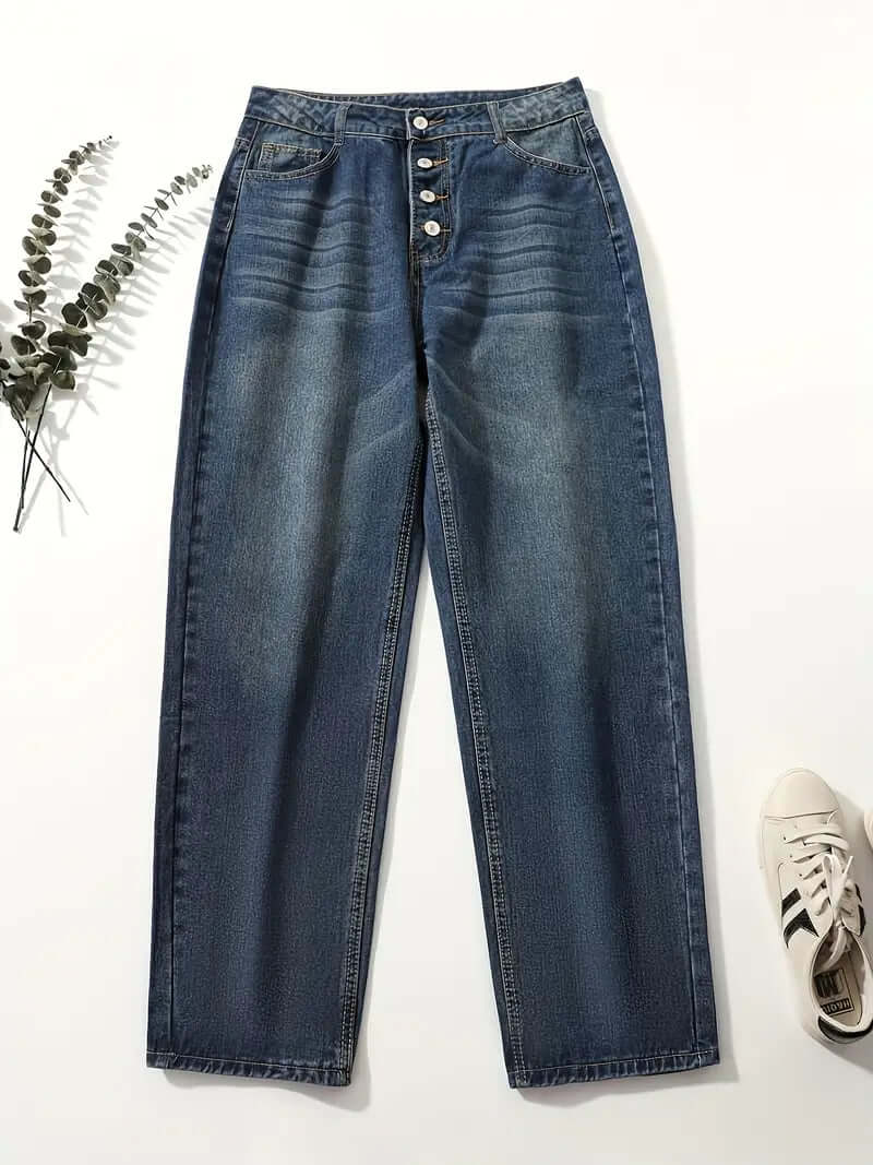 High-waisted loose fit denim jeans for women, offering a stylish and relaxed look.