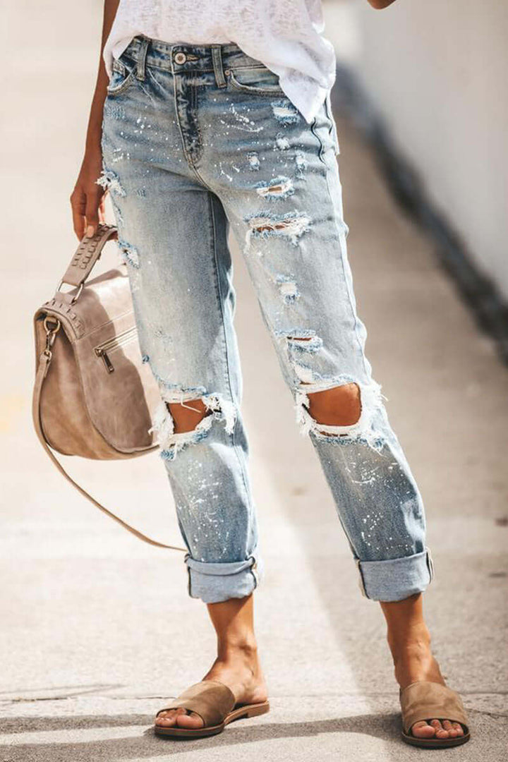 Women's high-waisted ripped straight leg jeans, perfect for trendy casual wear & effortless style.