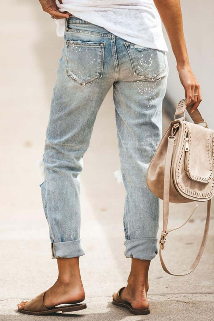Effortless women's high-waisted ripped jeans. Straight leg denim offers a comfort fit & casual style.