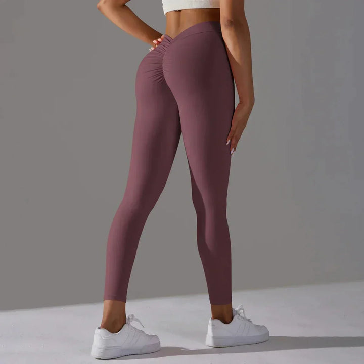 Stylish scrunch gym leggings for women, high-waisted, offering compression & activewear comfort.