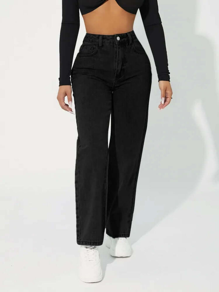 Women's high-waisted straight leg jeans in classic blue denim, offering a flattering and comfortable fit.