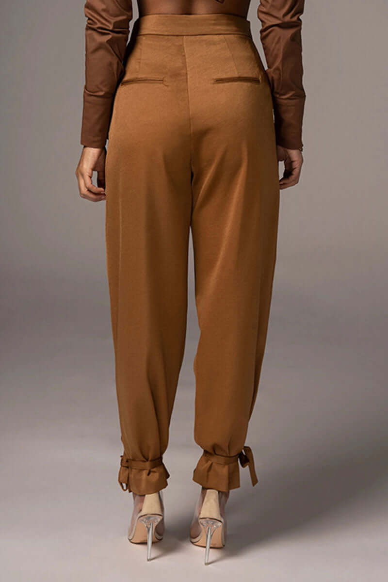 Comfortable & fashionable high-waisted tapered trousers for women, featuring chic ankle ties. Great for everyday.