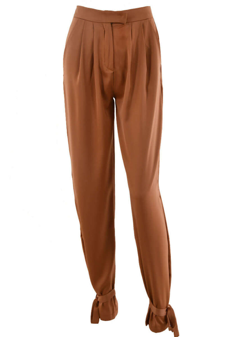 Stylish high-waisted tapered pants for women, with ankle ties. A comfortable & chic choice for any occasion.